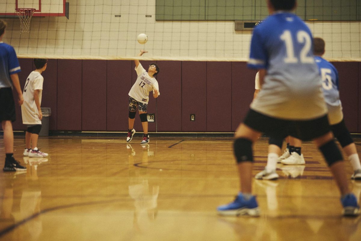 Adam Lollis serves the ball against Madeira Beach.