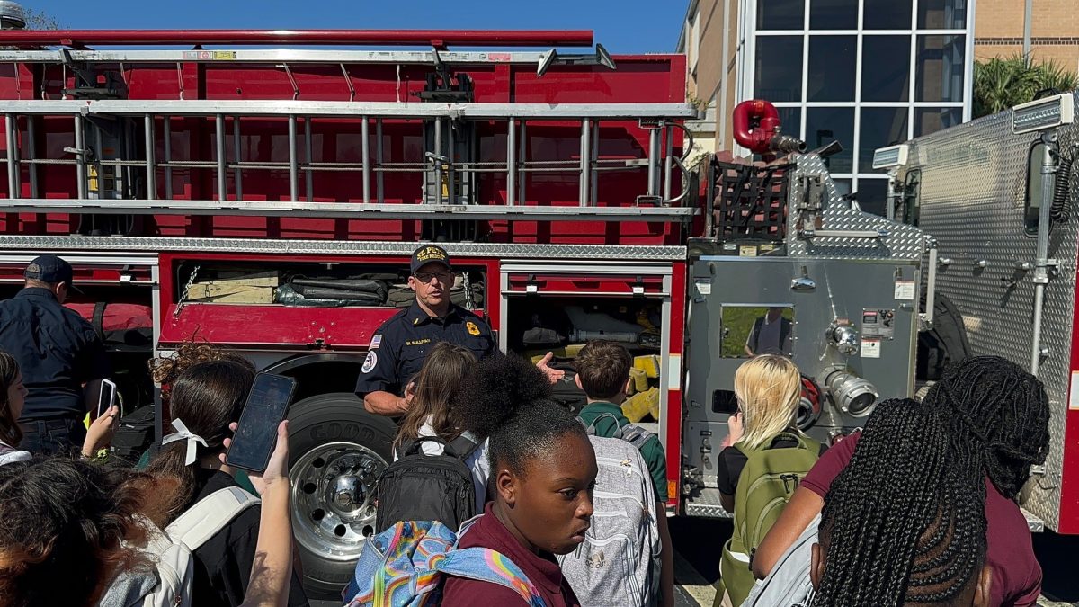 Scholars hear from St. Petersburg firefighters.