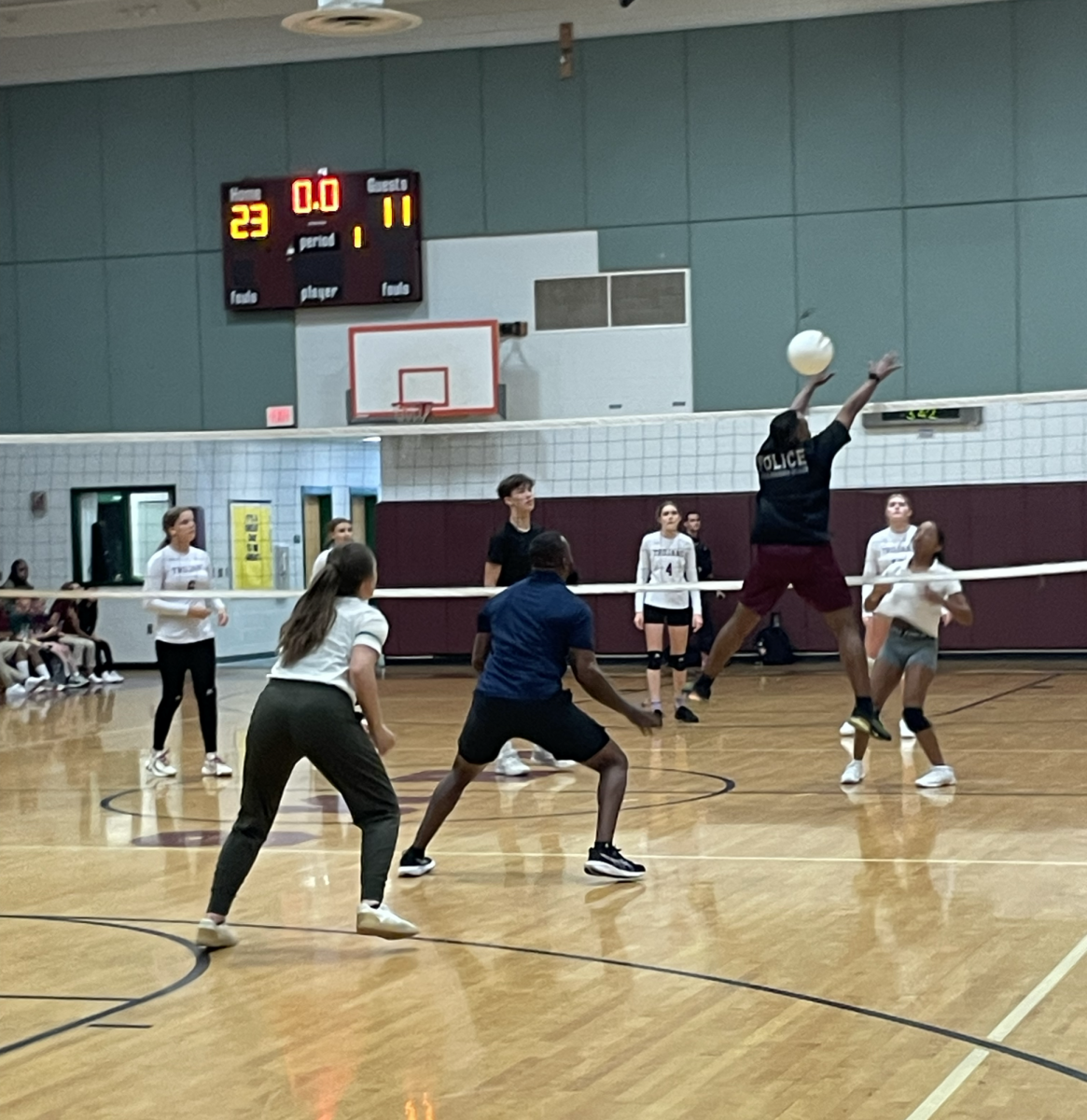 Scholars and faculty met on the volleyball court for the September PBIS event.