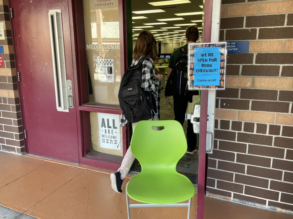 Scholars enter the Media Center before school when reading materials can be checked out.