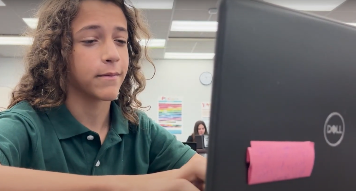 JHop scholars rely on their laptops to complete school work.