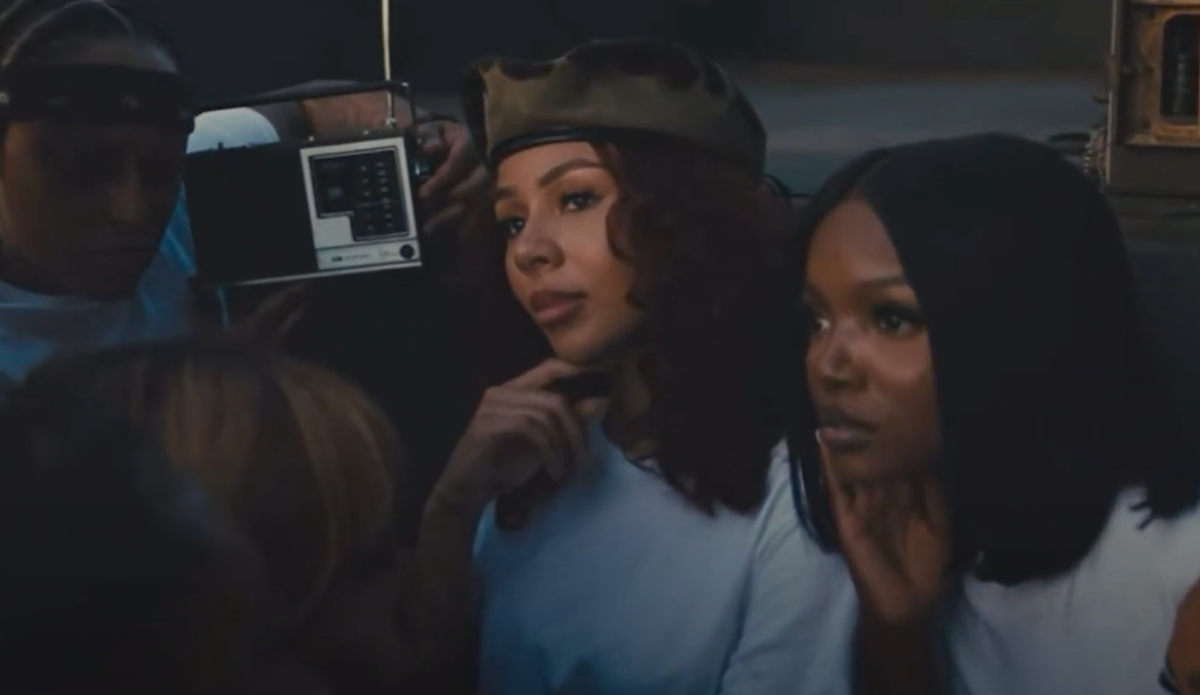 Mariah the Scientist appears in a video to promote her 2025 album, Hearts Sold Separately.