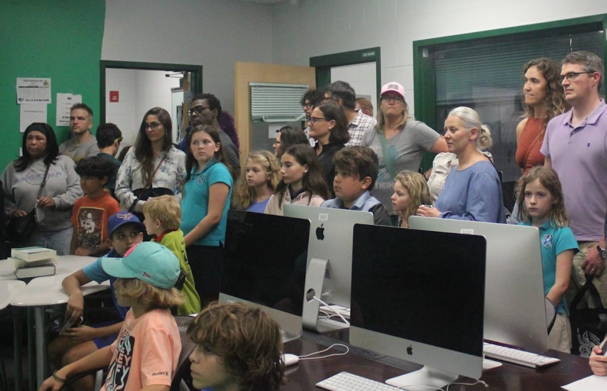 Prospective students and parents listened to JHop journalism students about the magnet program.