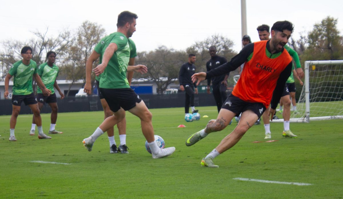 Rowdies midfielder Marco Micaletto celebrates moments after scoring a goal in practice.