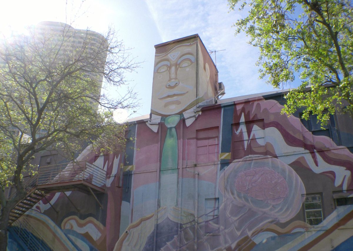 "Time to Think" was painted by Derek Donnelly and Sebastian Coolidge in 2014. Located on the back of the Florida CraftArt Building.